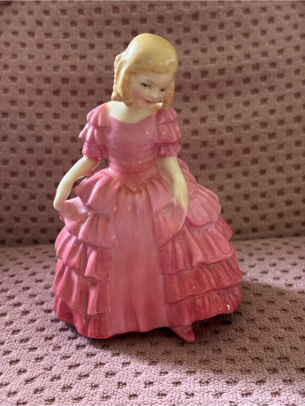Royal Doulton bone china figurine named "Rose," designed by Leslie Harradine.